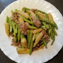 A picture of Sauteed Baby Corn and Asparagus.