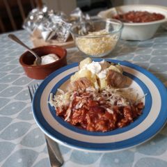 A picture of Baked Potatoes with Chilli.