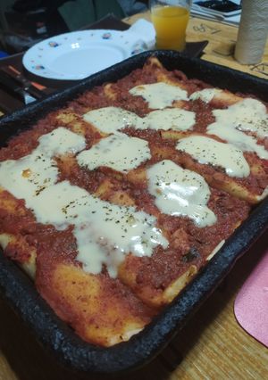 Una foto de Canelones de jamón y queso