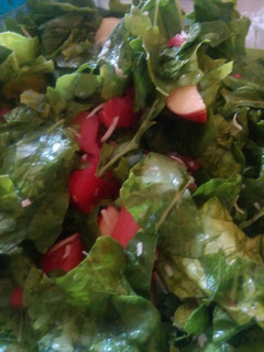 Una foto de Ensalada de espinacas con vinagreta de coco