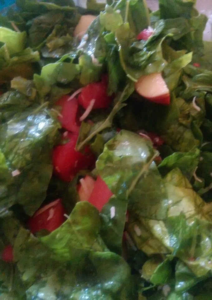 Una foto de Ensalada de espinacas con vinagreta de coco