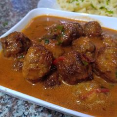 A picture of Meat ball in sauce.