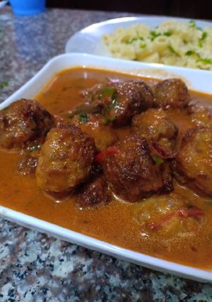 A picture of Meat ball in sauce.