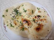 A picture of naan bread with baking powder