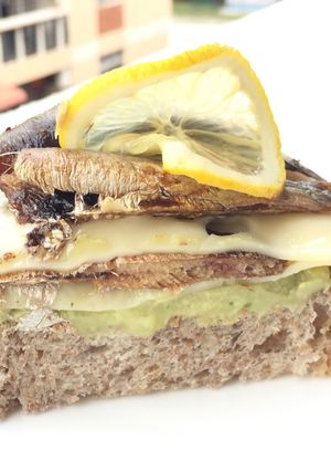 A picture of Avocado With Kieler Sprat And Swiss Cheese Sandwich.
