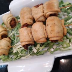 A picture of Chicken samosa skewers.