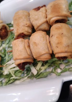 A picture of Chicken samosa skewers.