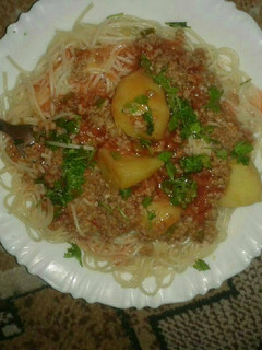 A picture of Spaghetti,minced meat potatoes.