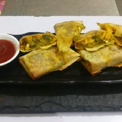 A picture of Broccoli,paneer, Capsicum stuffed roll.