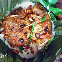 A picture of Steamed Fish Masala in Coconut Gravy.