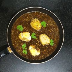A picture of Black Egg Curry.