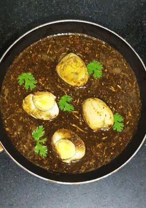 A picture of Black Egg Curry.