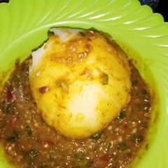 A picture of Tuwon Masara with Okro Soup.