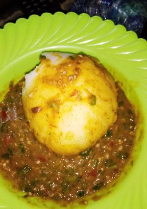 A picture of Tuwon Masara with Okro Soup.