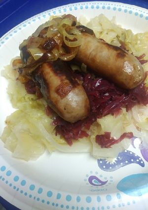 A picture of Beer Brats and Cabbage.
