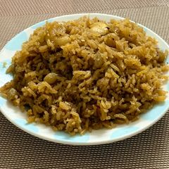 A picture of Narali Bhat (coconut rice).