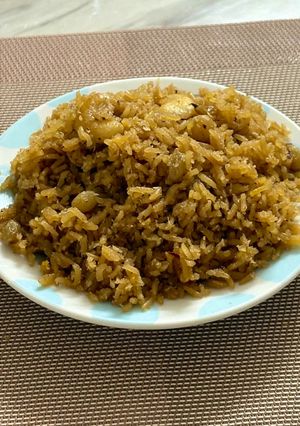 A picture of Narali Bhat (coconut rice).