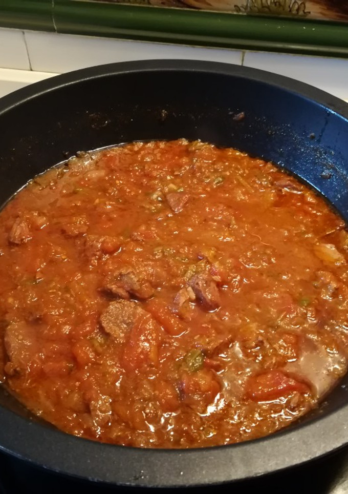 Una foto de Ternera con tomates