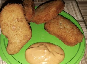 Una foto de Dip spicy con nugget