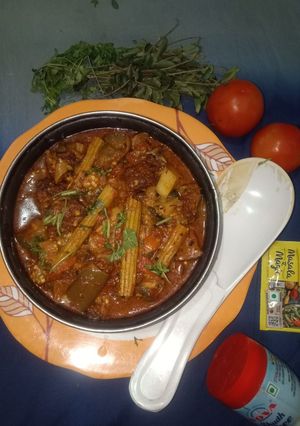 A picture of Drumstick, Eggplant, and Lentil Dumpling Curry.