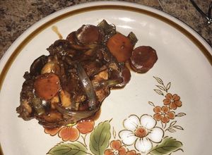 Una foto de Pollo 🍗 encebollado