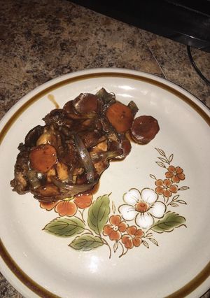 Una foto de Pollo 🍗 encebollado