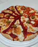 Pizza mitad morrones mitad napolitana