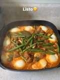 Huevos pochados en salsa