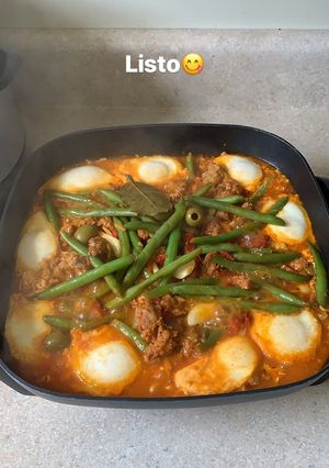 Foto principal de Huevos pochados en salsa