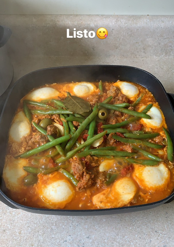 Una foto de Huevos pochados en salsa
