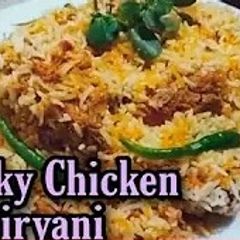 A picture of Smokey chicken biryani.