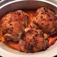 A picture of Paprika Roast Chicken with carrots.