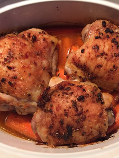 A picture of Paprika Roast Chicken with carrots.