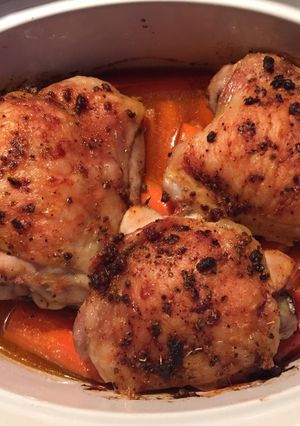 A picture of Paprika Roast Chicken with carrots.