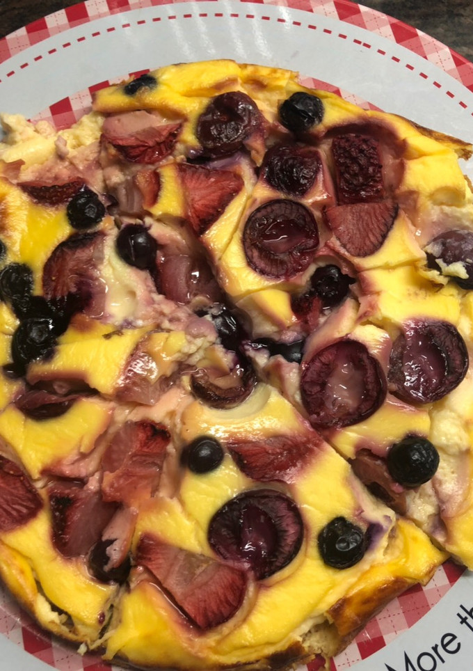 Una foto de Pastel de queso con frutos rojos
