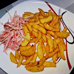 A picture of Pepper n tumeric fries with coleslaw salad#weeklyjikonichallenge.