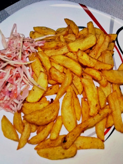 A picture of Pepper n tumeric fries with coleslaw salad#weeklyjikonichallenge.