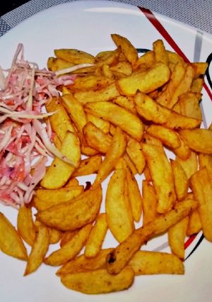 A picture of Pepper n tumeric fries with coleslaw salad#weeklyjikonichallenge.