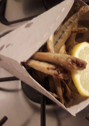 Una foto de Cornalitos fritos en cono