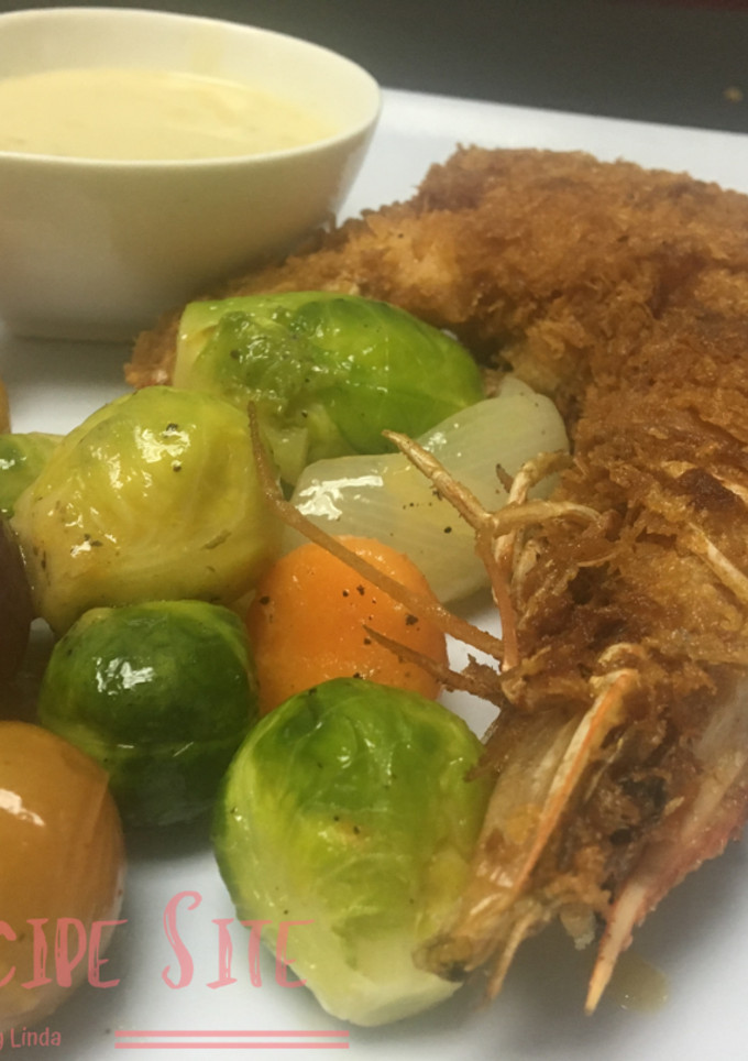 Una foto de Camarones Rellenos De Chipilín Albardados De Tocinoen salsa de blue cheese