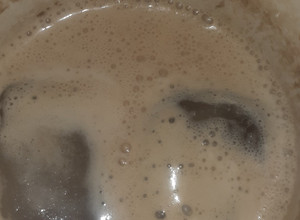Una foto de Licuado de café y Esencia de vainilla