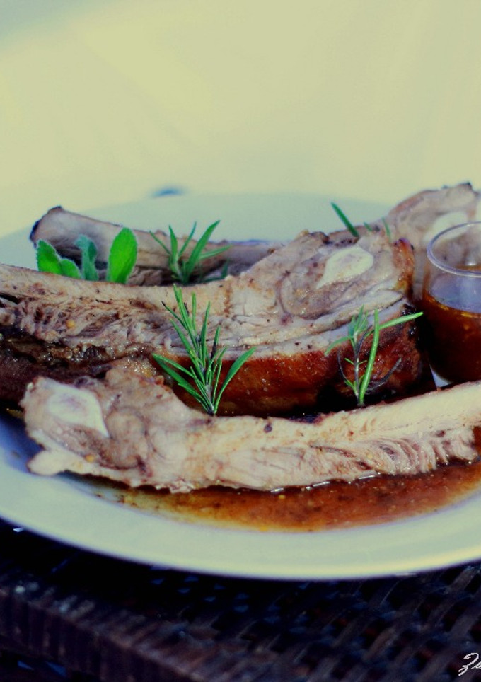Una foto de Costillas de Cerdo Asadas con Coca-Cola y Especies