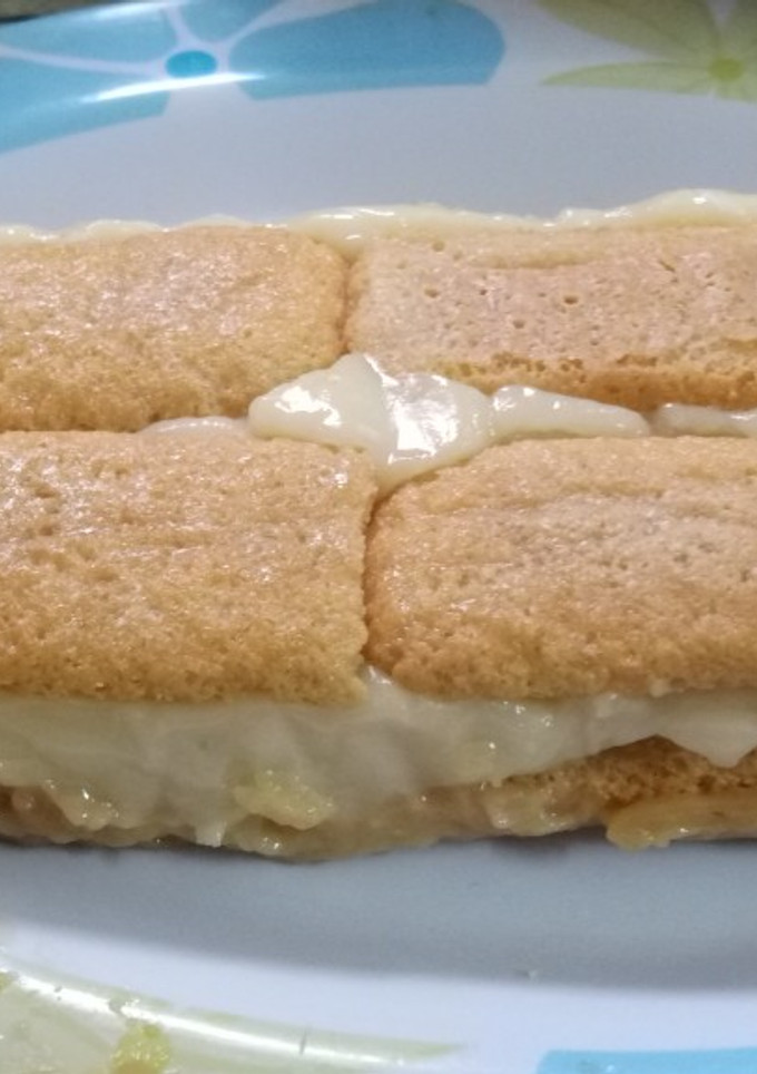 Una foto de Postre borrachito con vainillas y pastelera