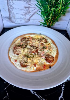 Une photo de Pizzas 🍕 wraps aux lardons et saucisses fumées