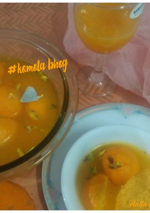 A picture of #Komola bhog#orange flavour rasgulla.