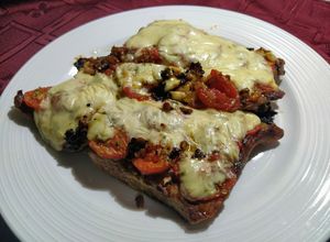 Una foto de Churrasquitos de cerdo al horno a la pizza
