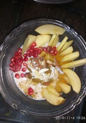 A picture of Milk oats with fruits and nuts.
