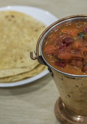 A picture of Veg Kurma (Kerala Style) & Chapathi.