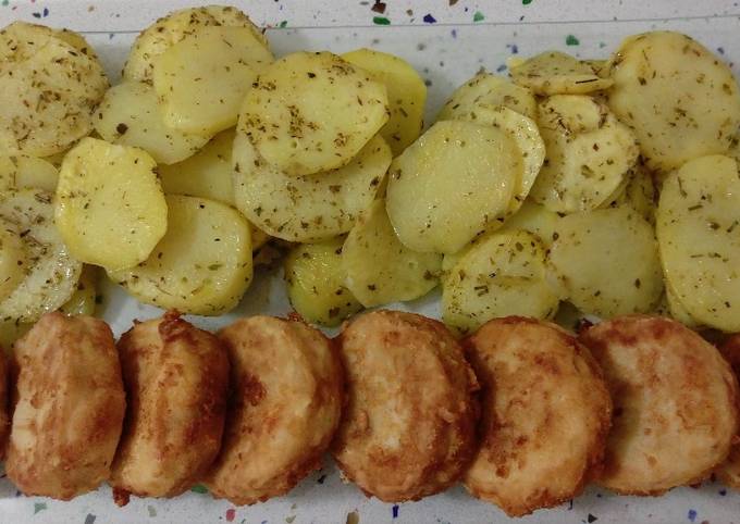 Foto principal de Merluza frita y patatas al vapor
