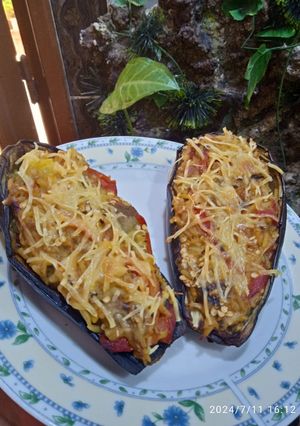 Une photo de Barquette d'aubergines et de poivrons rouges